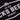 Docks Beers logo detail, highlighting the "Est 2018 Grimsby" branding, printed in bold white across the chest.