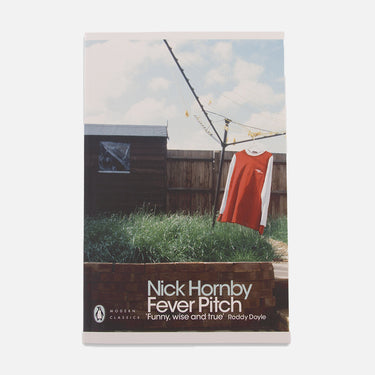 Front cover of Fever Pitch by Nick Hornby featuring a football goalpost in a London backyard