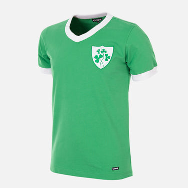 Flat lay of the Ireland 1965 Retro Football Shirt, featuring a classic green design with a white collar and cuffs.