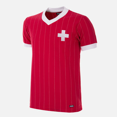 Flat-lay of the Switzerland 1982 Retro Football Shirt, featuring a red pinstripe design with a white cross emblem.