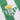 Close-up of the embroidered Real Betis crest with golden crown on the shirt.