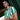 Model wearing the Real Betis 1976 - 77 Retro Football Shirt, posing against a wooden background.