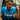 Model wearing the Maradona X COPA Napoli 1986-87 Retro Football Shirt, seated in an urban setting, showcasing its fit and style.