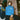 Young man wearing the blue Inter Milan track jacket in a modern indoor setting