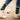 model wearing casual green socks with a repeating pixel-style illustration of a dutch iconic football moment at euro 1988