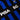 Close-up of the Pisa S.C. retro football shirt featuring black and blue stripes with a bold white sponsor print.