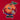 Close-up of Naranjito Mascot printed on the t-shirt, showcasing its cheerful expression and retro football design.