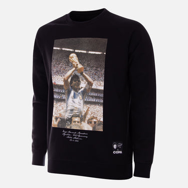 Flat-lay of the black sweater with Maradona celebrating printed on the front