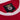 Benfica logo on the collar, highlighting premium embroidery and the official club branding of this retro-inspired design.