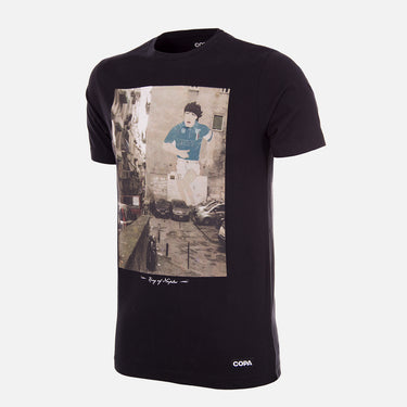 Flat-lay of the King of Naples T-Shirt, featuring a black base with a printed image of Diego Maradona on the front.