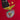 Close-up of embroidered Benfica crest with three stars on black fabric.