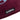 Close-up of the embroidered COPA logo stitched onto the maroon fabric.