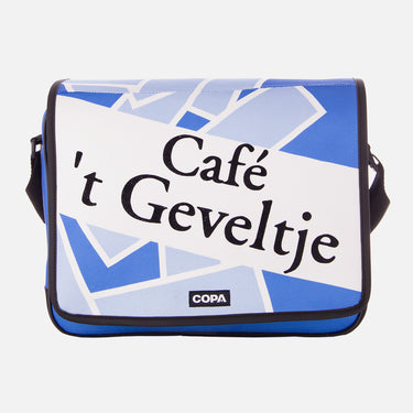 Flat-lay of the blue and white Recycled Courier Bag with bold “Café ’t Geveltje” text across the front flap.