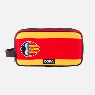 Front view of the recycled toiletry bag featuring a repurposed football shirt with a Valencia badge and COPA logo