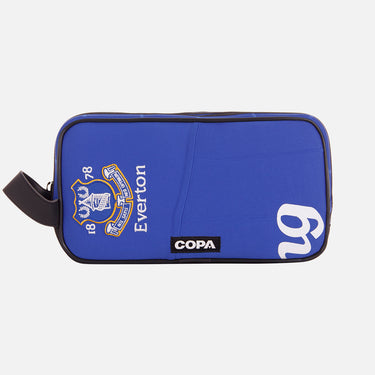 Front view of the recycled toiletry bag featuring a repurposed football shirt with a Everton badge and COPA logo