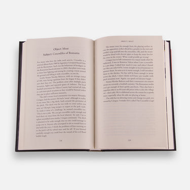 Open book showing introductory text on left page and blank right page