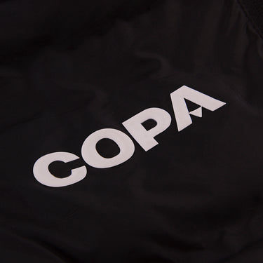 Close-up of the inside lining featuring a large white COPA logo