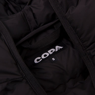 Close-up of the inside of the hood showing the COPA logo label