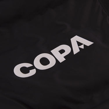 Close-up of the inside lining featuring a large white COPA logo