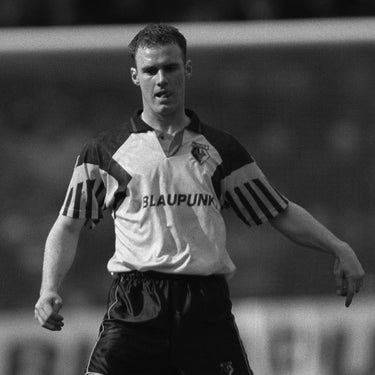 Watford FC 1994 - 95 Retro Football Shirt Yellow & Black Vintage Photo black-and-white action shot of a player wearing the kit.