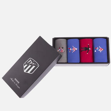 Set of three Atletico de Madrid socks displayed in open box