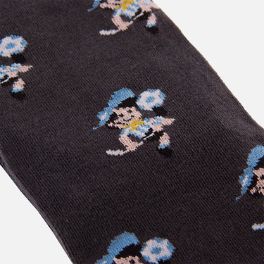 detail of illustration of a smiling argentine footballer white blue on casual black socks