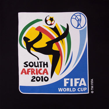 Close-up of the South Africa 2010 World Cup emblem, with a footballer silhouette and vibrant colors symbolizing African energy.