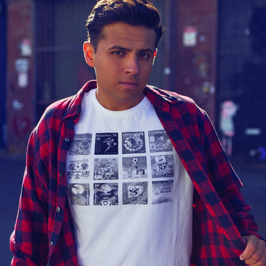 Model wearing the T-shirt, styled with an open red jacket, emphasizing the retro-inspired football sticker collage design.