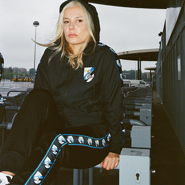 Model wearing FC Internazionale Taper Pants