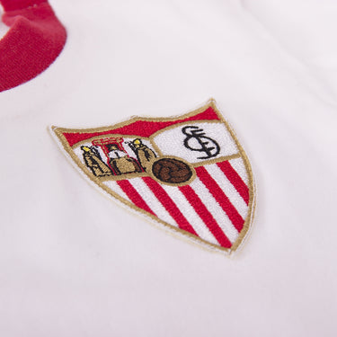 Close-up of the Sevilla FC crest embroidered on the 'My First Football Shirt'.