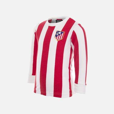 Flat lay of the Atletico de Madrid 'My First Football Shirt', featuring the classic red and white stripes.