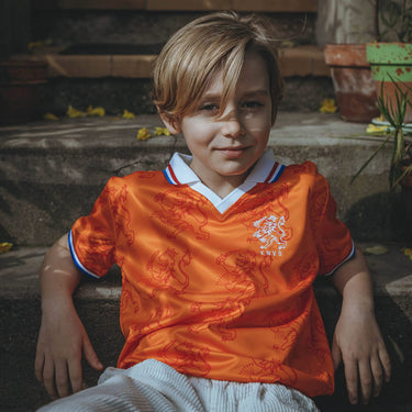 Kid wearing a Holland World Cup 1994 Kids Retro Football Shirt