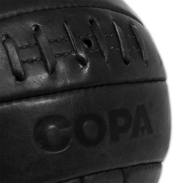 Side view of COPA Retro Football 1950's with clear visibility of the ball's texture and stitching