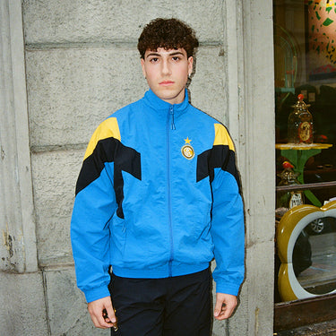 Young man wearing the Inter Milan retro track jacket in an urban setting